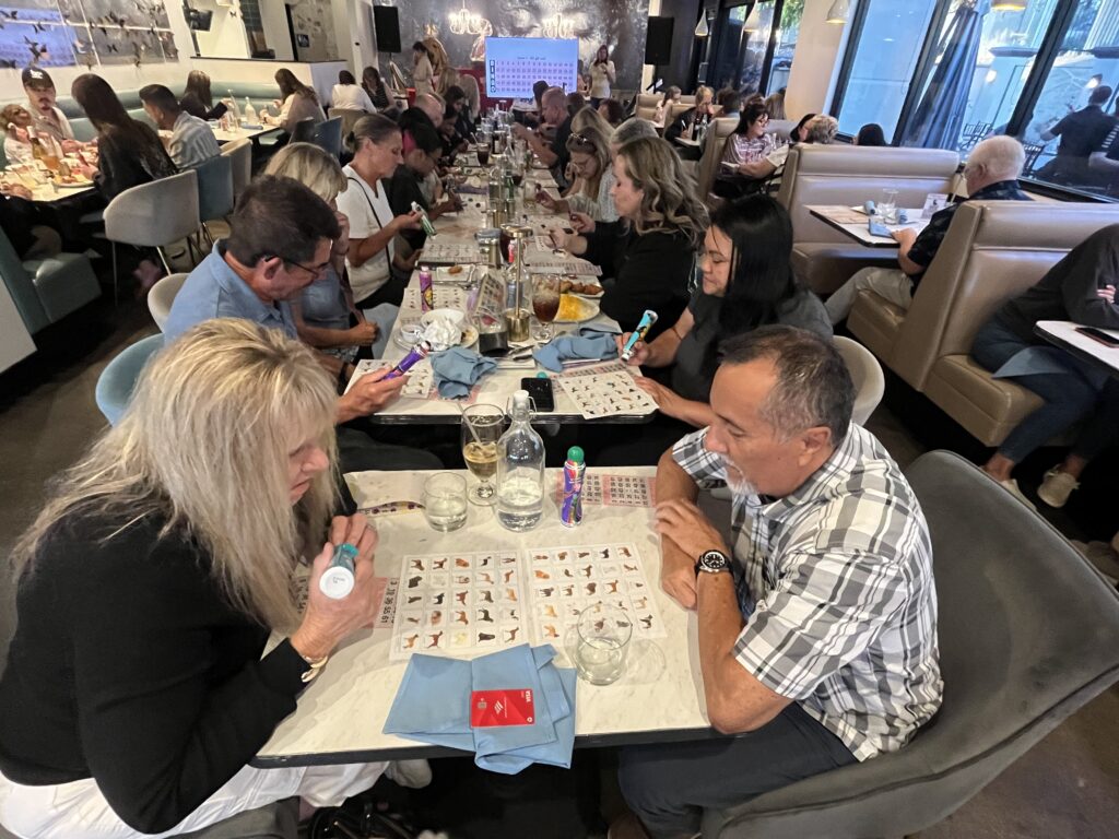 Guests playing Bingo at a Labradors and Friends fundraiser