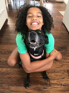 Apple sharing a happy moment with a member of her family.